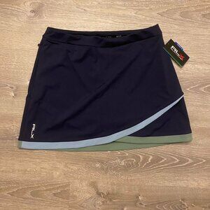 Navy and green RLX Ralph Lauren mini tennis skirt with built-in shorts